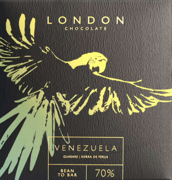 Front packaging of London Chocolate 70% Venezuela Guasare with black background and a sketch of a bird in yellow and green